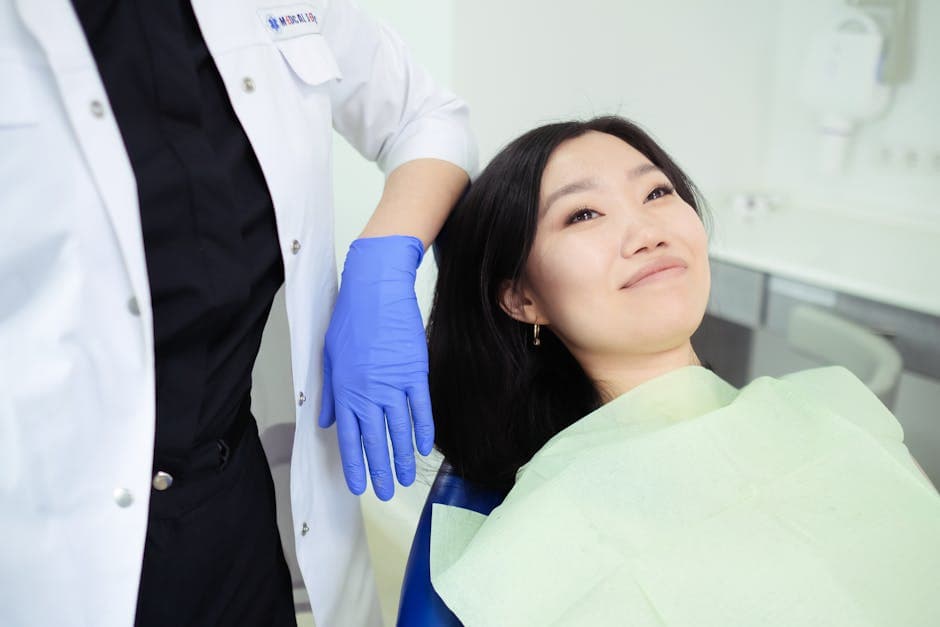 Patient smiling during a dental checkup