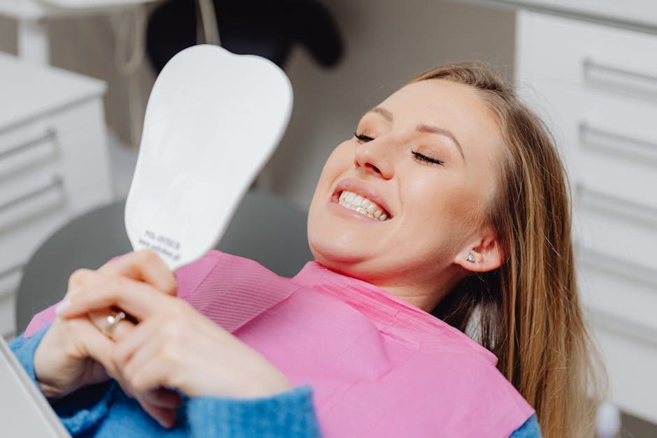 Dentist caring for a patient at Bedford Family Dentistry